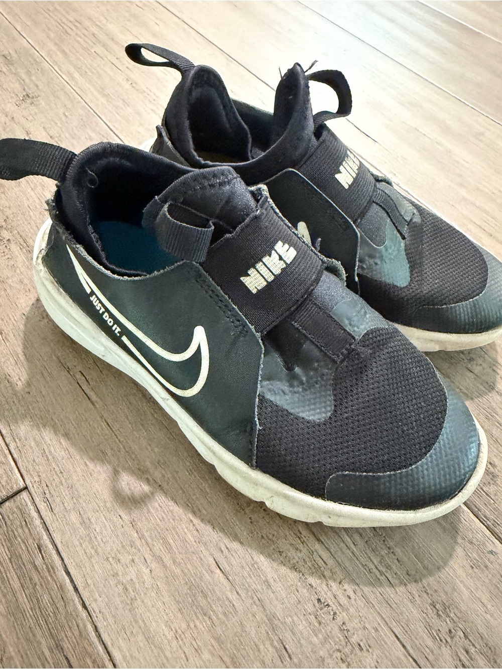 Nike Kids Black and White Slip-On Sneakers